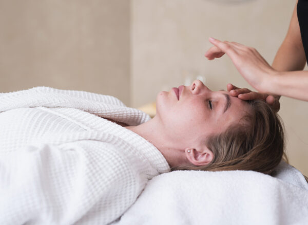close-up-relaxed-woman-getting-facial-treatment close-up-relaxed-woman-getting-facial-treatment